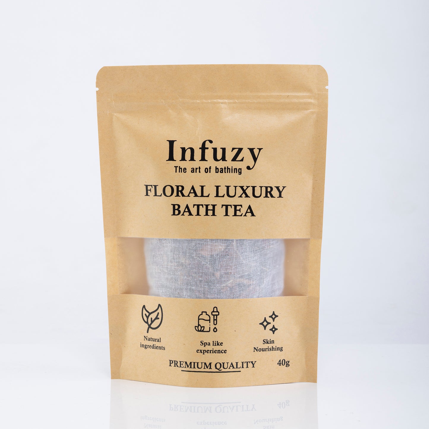 A package of Infuzy Floral Luxury Bath Tea with a visible clear window showing the tea bags inside. The packaging is primarily beige with black and white text and design elements, indicating premium quality and containing 40g of product.