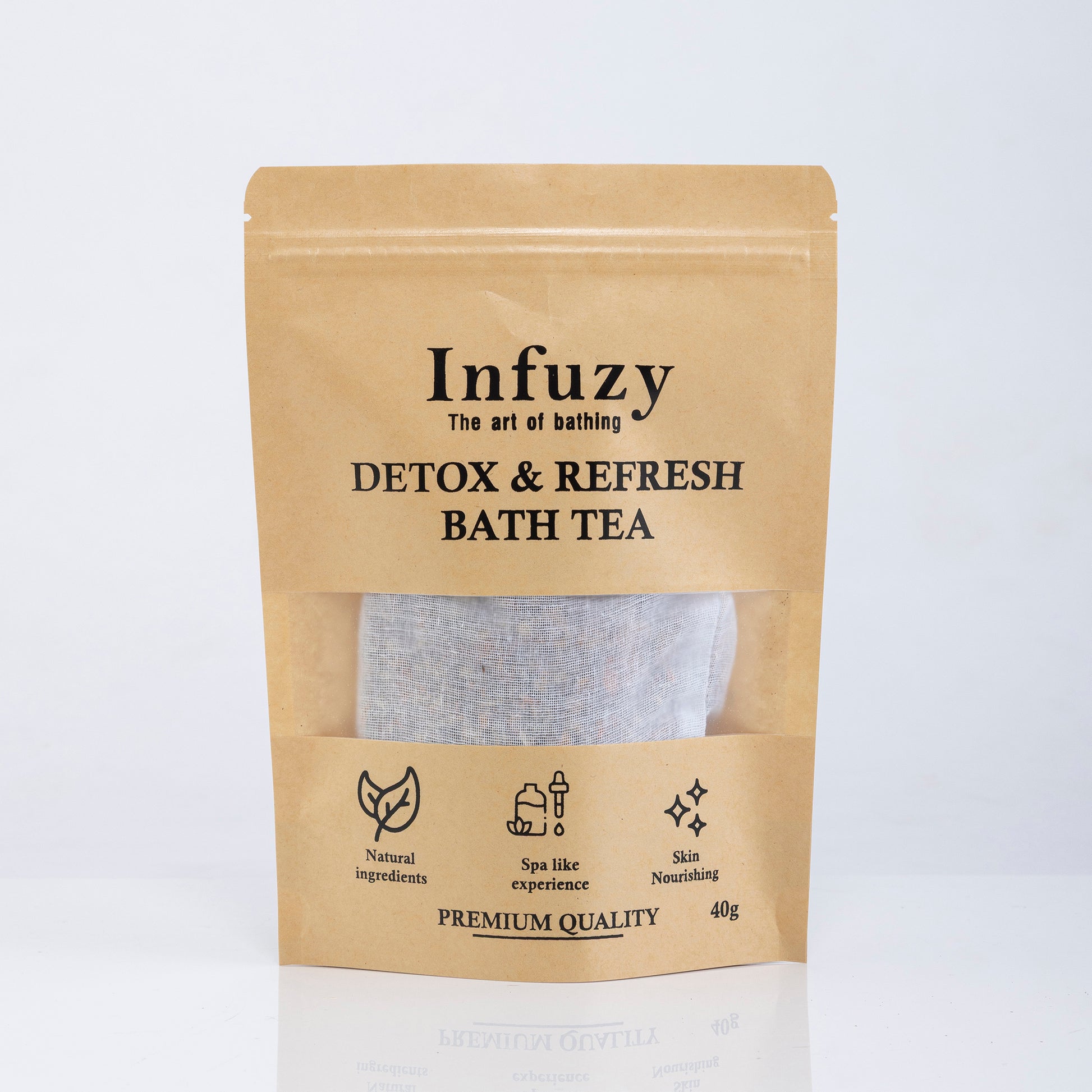 A package of Infuzy Detox & Refresh Bath Tea with a visible tea bag through a clear window, labeled as premium quality and 45g in weight.